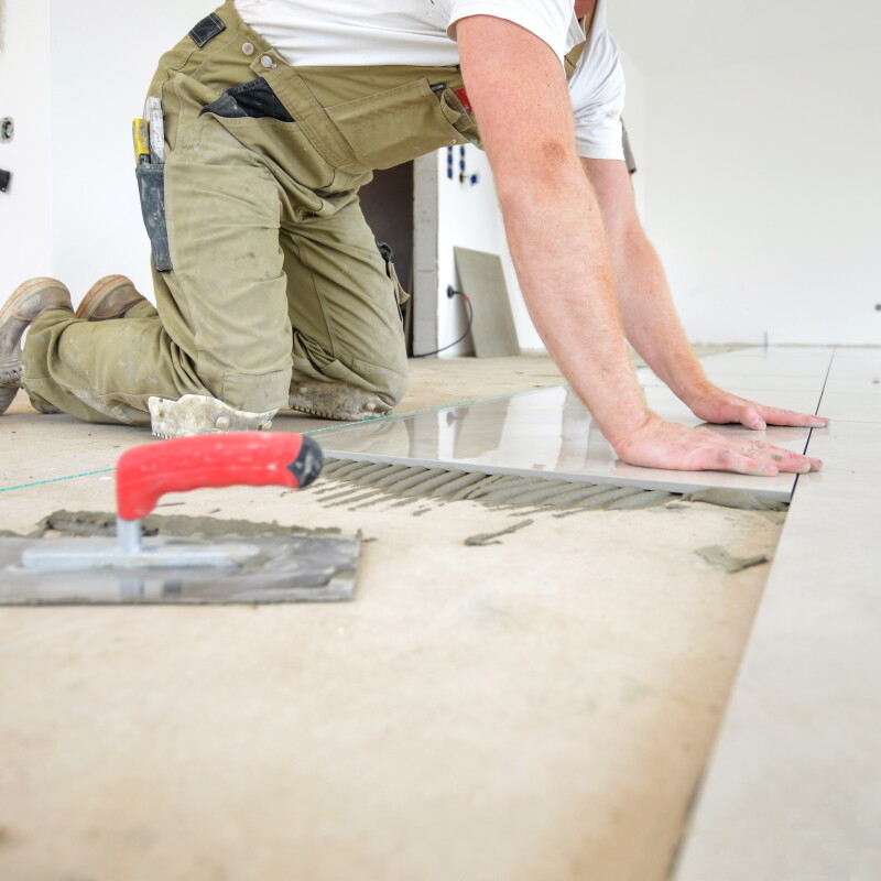 Tiler Laying